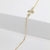 Pulsera cruz bicolor 22cm